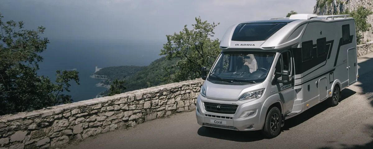 A motorhome on a coast road